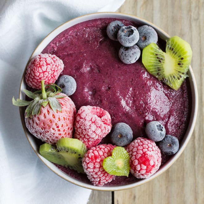 Acai and Blueberry Smoothie Bowl - Refreshingly delicious start to the day whizzed up in just a couple of minutes! With fruity acai berry for extra antioxidant zing! Vegan and gluten free | thecookandhim.com
