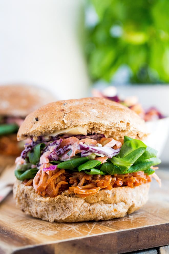BBQ Jackfruit Sliders - delectably moist and packed with sweet sticky BBQ flavour. This vegan version of pulled pork is SO tasty, moreish and easy! Recipe on thecookandhim.com