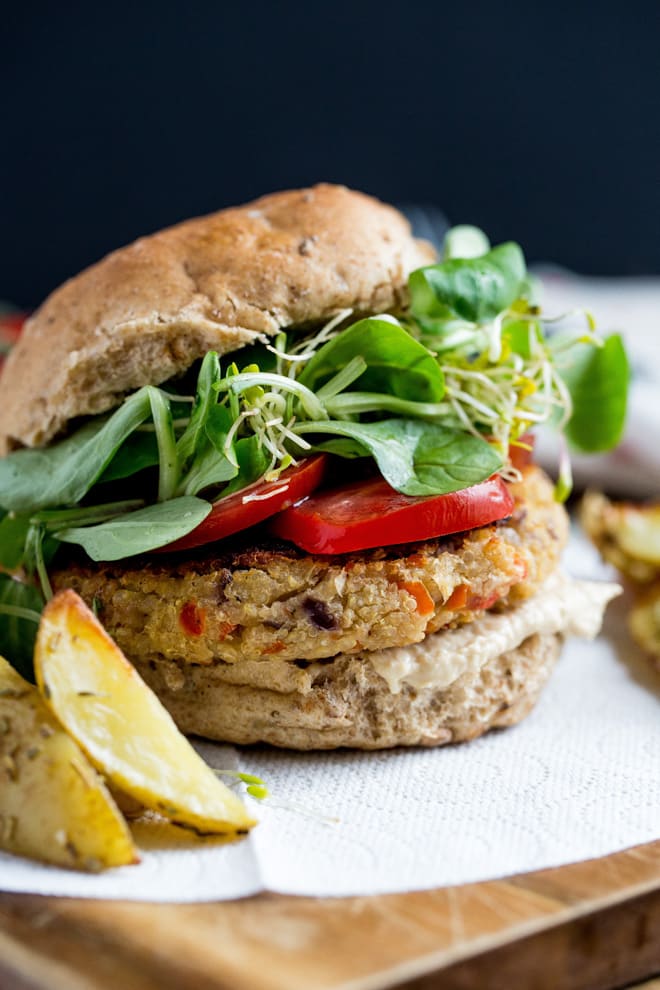 Camembert and Quinoa Burgers - lots of heart healthy veggies, beans, quinoa and vegan cheese go into these super tasty and super easy to make vegan burgers! Recipe on thecookandhim.com