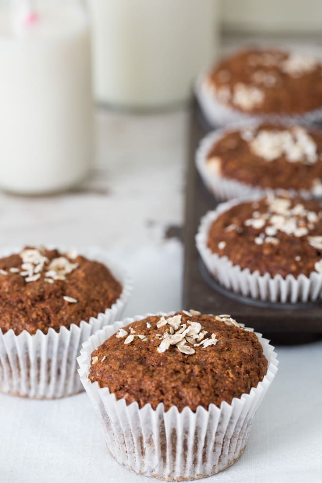 Carrot Cake Muffins - these vegan muffins are gently spiced, divinely sweet and packed with flavour and goodness - carrots, flax seeds, coconut sugar and whole meal flour | thecookandhim.com