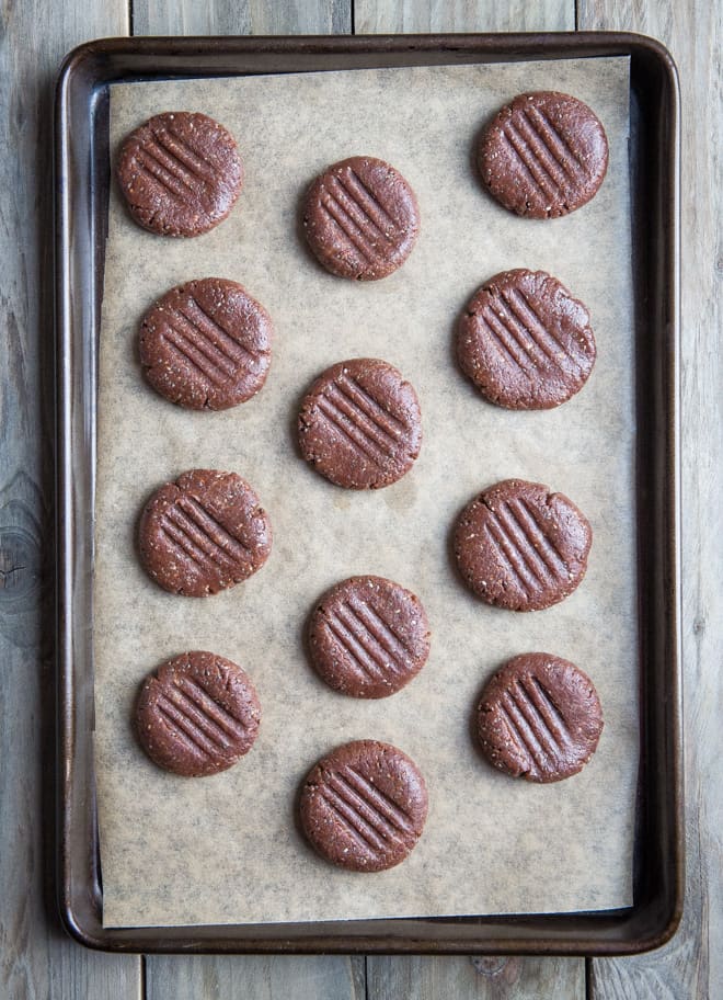 Chia Chocolate Cookies - just 5 ingredients and a delicious texture make these vegan and gluten free cookies the perfect anytime snack. Satisfying both peanut butter and chocolate cravings - both very real things right? | thecookandhim.com