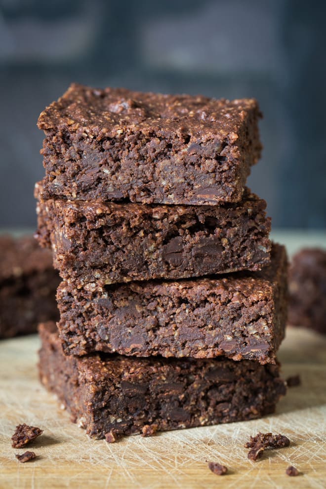 Chocolate and Blackcurrant Brownies - soft and fudgy melt in the mouth vegan and gluten free brownies! Delicious oats and almonds make the base with wonderful pops of dark chocolate chips and blackberry | thecookandhim.com