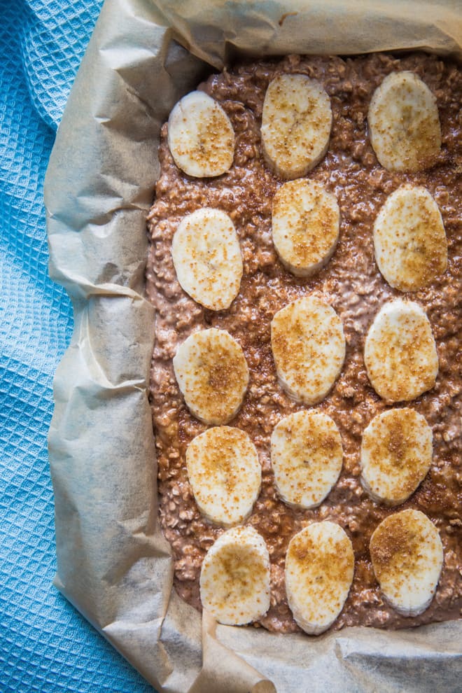 Chocolate, Banana and Peanut Butter Baked Oats - delicious make ahead breakfast for busy mornings. Rich and chocolatey, no refined sugar but plenty of protein rich and tummy filling oats! Vegan and Gluten Free | thecookandhim.com