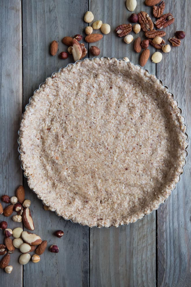 Chocolate Orange Nutty Truffle Tart - silky smooth, not too sweet and filled with rich dark orange chocolate - utterly delicious as well as vegan and gluten free | thecookandhim.com