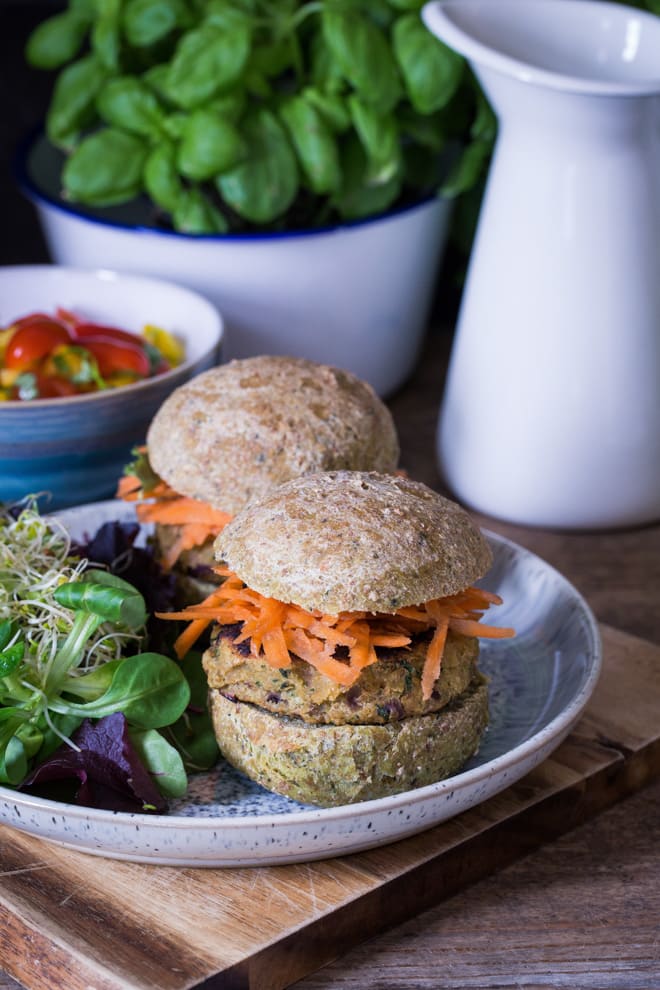 Falafel Burgers with Spinach Oat Rolls - super easy, full of flavour falafel made with chickpeas and flavoured with onion, garlic and basil. You don't need to make your own bread rolls but these oaty spinach ones are SO worth it | thecookandhim.com