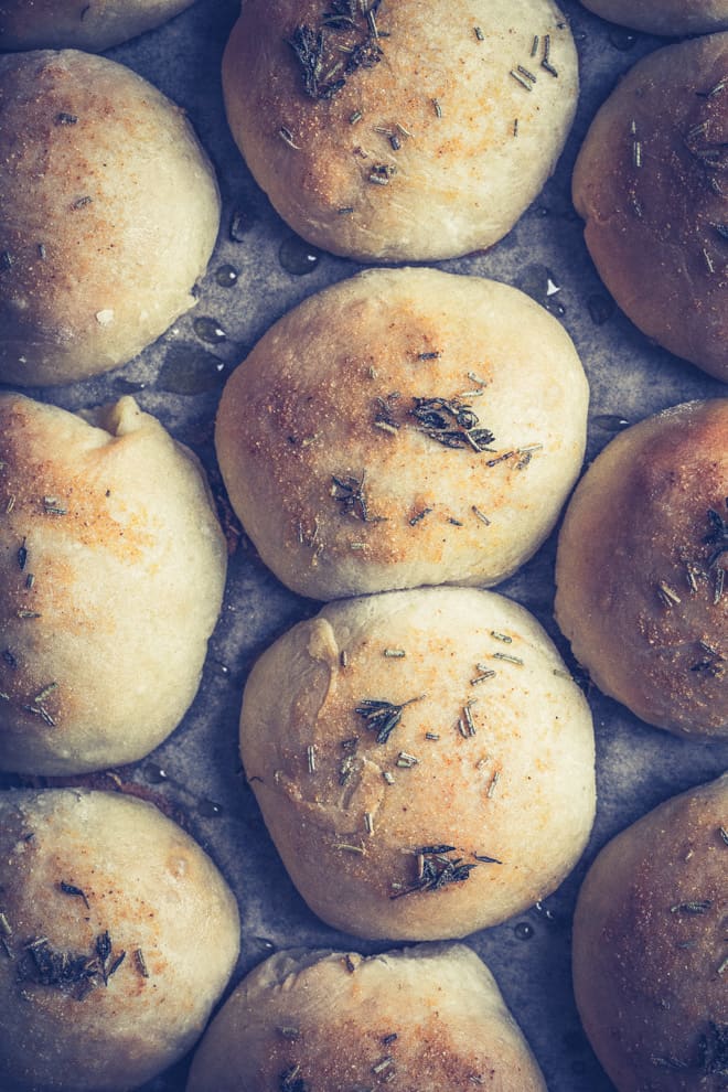 Garlic and Herbes de Provence Cheese Bombs - a light, no knead pizza dough stuffed with vegan herb cheese and brushed with garlic oil | thecookandhim.com