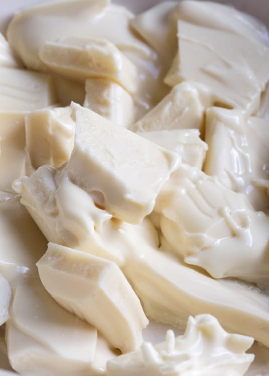 Melted white chocolate for Halloween Bark | thecookandhim.com