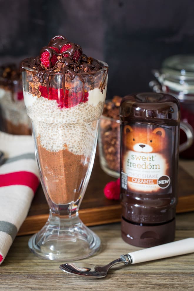 Neapolitan Breakfast Parfait - Layers of vanilla and chocolate chia pudding, raspberry jam, coconut yoghurt and a deliciously crunchy hazelnut and chocolate granola! Vegan and gluten free | thecookandhim.com