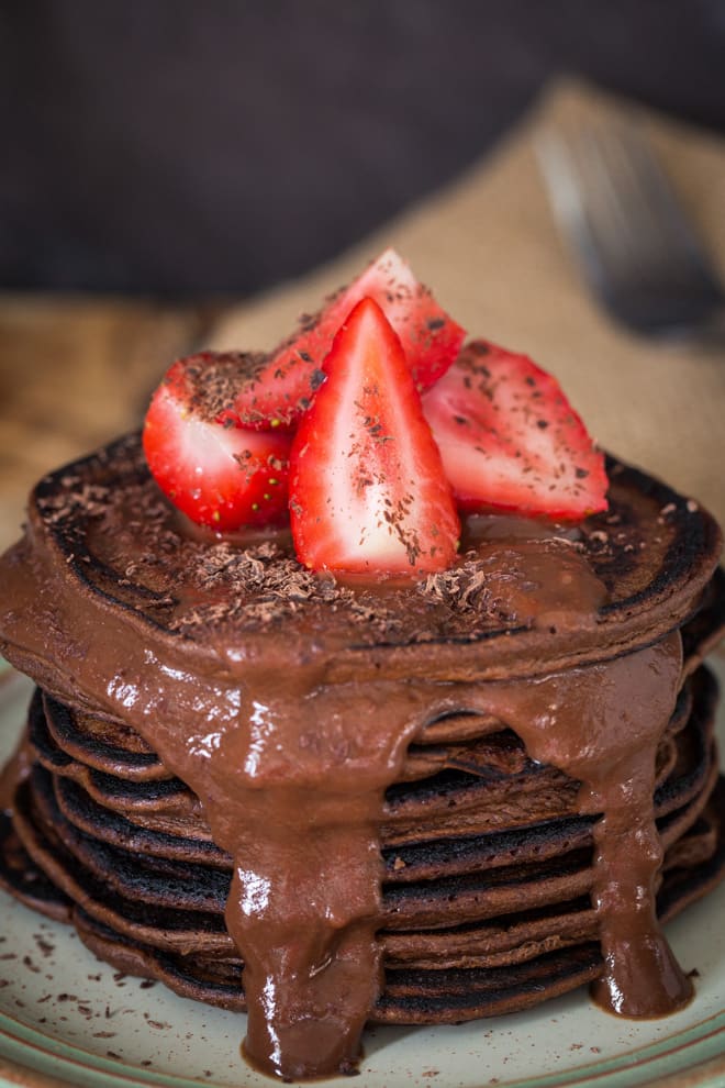 Oaty Chocolate Pancakes with Chocolate Sauce - as decadent as they are healthy and as easy to make as they are tasty - packed with extra protein and chocolate deliciousness | thecookandhim.com