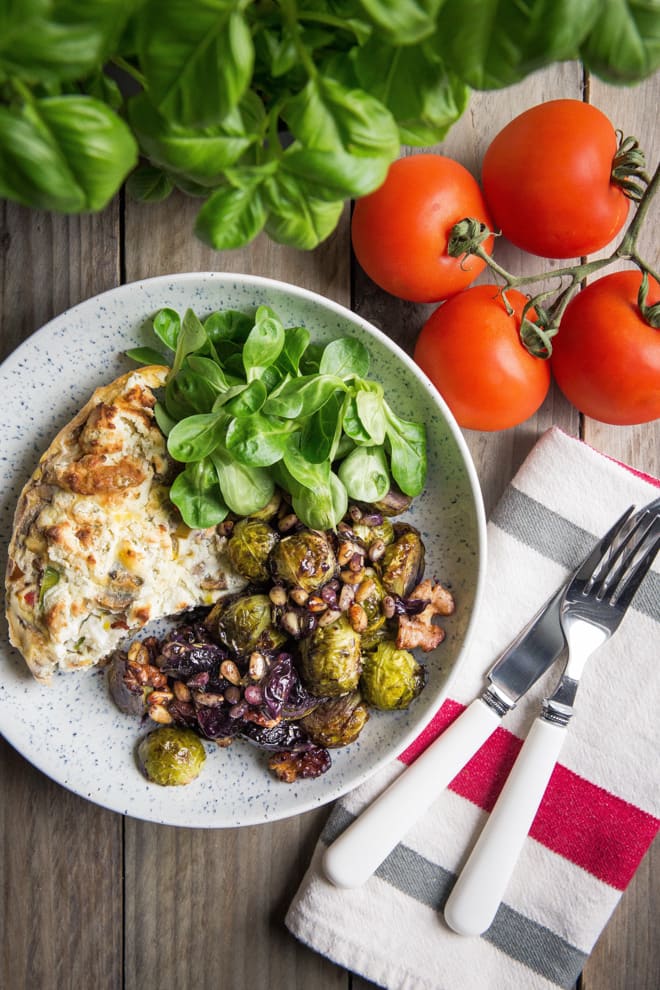 Roasted Sprouts, Grapes and Walnuts - super simple side to accompany so many things! Nutty sprouts, sweet grapes and crunchy walnuts and pinenuts with a dash of herbs, balsamic and mustard. Vegan and gluten free | thecookandhim.com