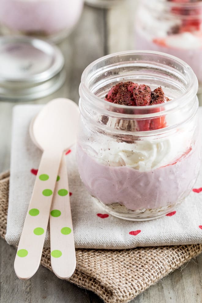 Strawberry Cheesecake Sundaes - the perfect summer treat! Nuts and sweet dates make the base, fresh strawberries, creamy cashews and almond milk make the 'cheesecake'. Top with even more fresh strawberries and coconut yoghurt - vegan and gluten free! Recipe on thecookandhim.com