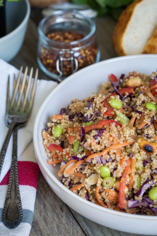 Thai Quinoa Salad with Almond Butter Dressing - crammed full of fresh vegetables and salty dry fried peanuts with a light but spicy, rich and creamy full of flavour dressing! #vegan #glutenfree #meatfree #salad | thecookandhim.com