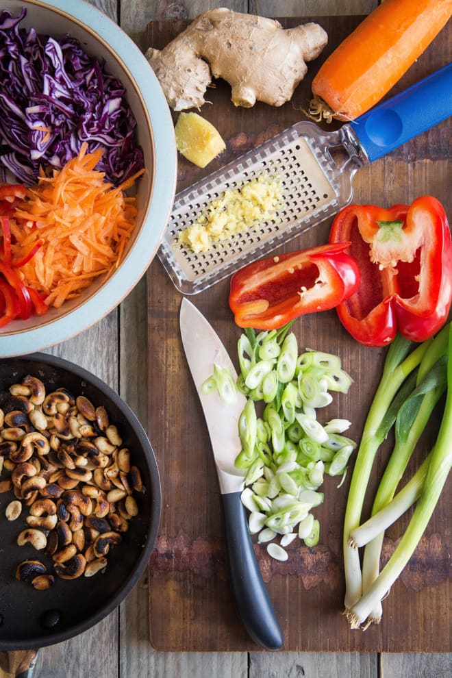 Thai Quinoa Salad with Almond Butter Dressing - crammed full of fresh vegetables and salty dry fried peanuts with a light but spicy, rich and creamy full of flavour dressing! #vegan #glutenfree #meatfree #salad | thecookandhim.com