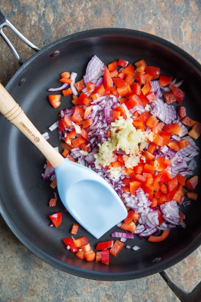 Tomato Pearl Barley Risotto - delicious one pan light but filling summer dish! Crammed with tomato flavour and 'hidden' veggies this is super easy comfort food. Vegan and gluten free. Recipe on thecookandhim.com