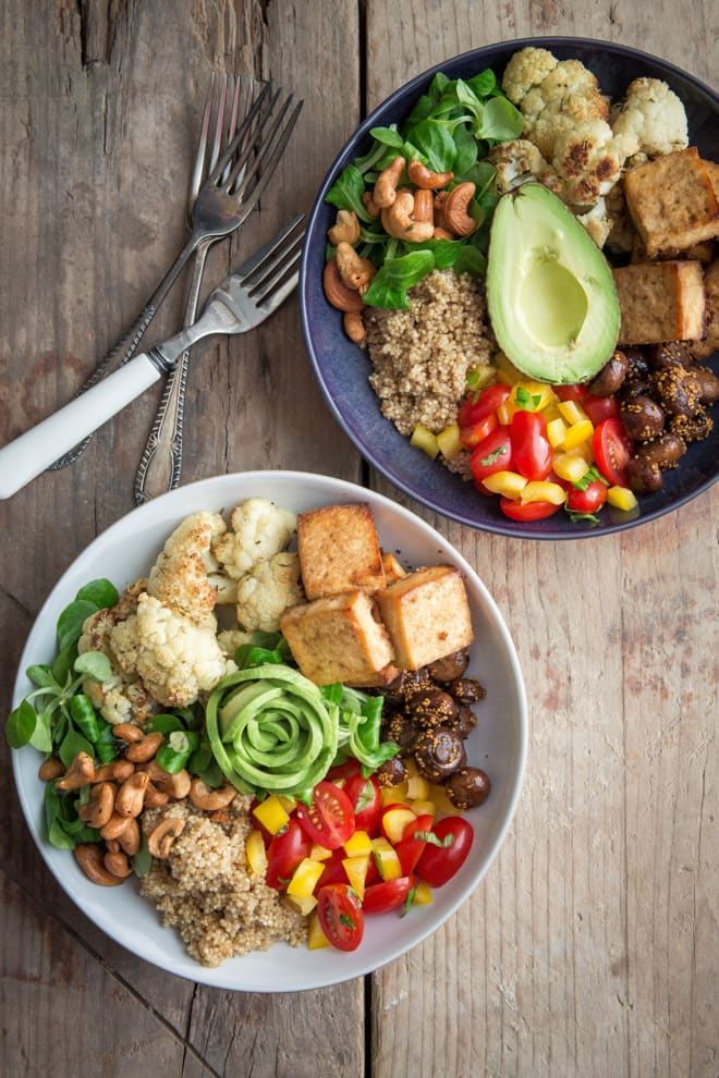 Vegan Buddha Bowl with Spicy Peanut Dressing - a great healthy take to work lunch or one bowl one fork Netflix marathon evening meal! Roasted cauliflower, herby cashews, crisp baked tofu, roasted mushrooms, spicy quinoa all vegan and gluten free | thecookandhim.com