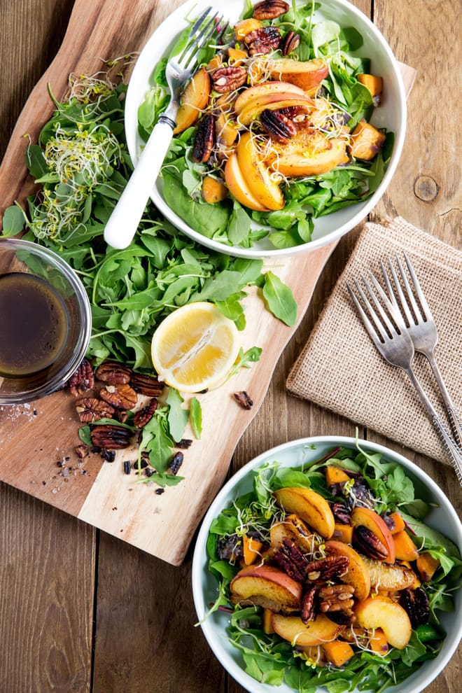 Warm Peach and Sweet Potato Salad with Balsamic Dressing - the perfect summery salad - crisp leaves, salty toasted nuts with warm peaches and sweet potatoes, all bound together with a tangy balsamic dressing! Vegan and Gluten Free | Recipe on thecookandhim.com