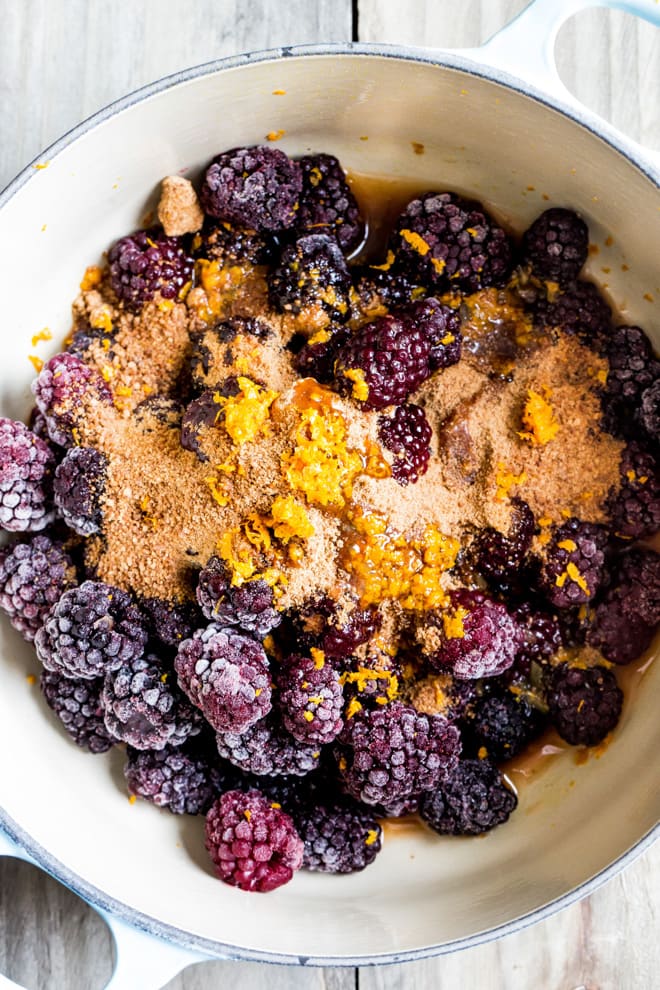 Blackberry Jam Coconut Pudding - Sticky, sweet homemade blackberry jam and soft, chewy, spongy, crumbly topping using coconut sugar, coconut flour and dessicated coconut | #vegan #veganbaking #glutenfree | Recipe on thecookandhim.com