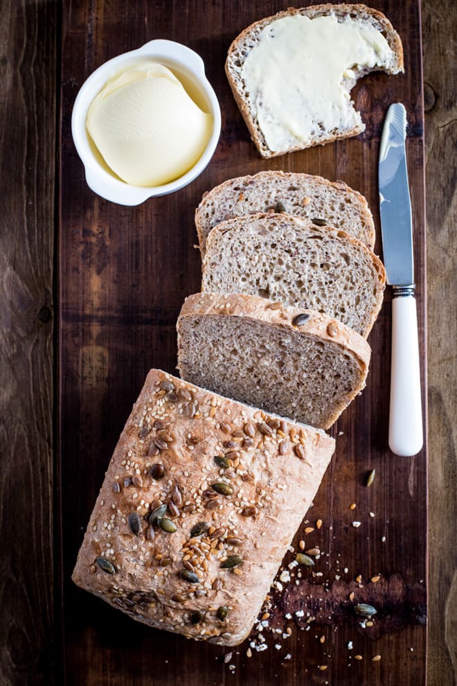 Kombucha Bread - a light, delicious loaf with a nutty flax seed crunch and a flavour boost from gut healthy kombucha! #bread #veganbread #veganbaking | Recipe on thecookandhim.com