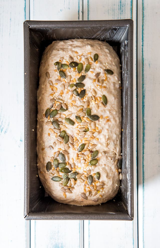Kombucha Bread - a light, delicious loaf with a nutty flax seed crunch and a flavour boost from gut healthy kombucha! #bread #veganbread #veganbaking | Recipe on thecookandhim.com