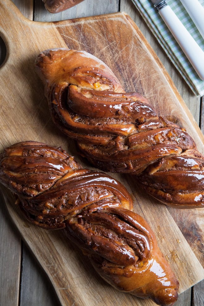 Spiced Chocolate Orange Twists - all the flavours of Christmas in this soft yeast dough flavoured with warming spices, chocolate nut butter and sweet sticky orange #christmasbaking #christmasfood #bread | Recipe on thecookandhim.com