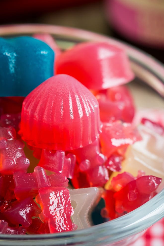Vegan Jellies - healthy little bite sized treats full of natural sweet flavour and gut friendly kombucha! These are SO ridiculously easy to make and so easily adaptable for your own flavour combos! #vegan #gummies | Recipe on thecookandhim.com