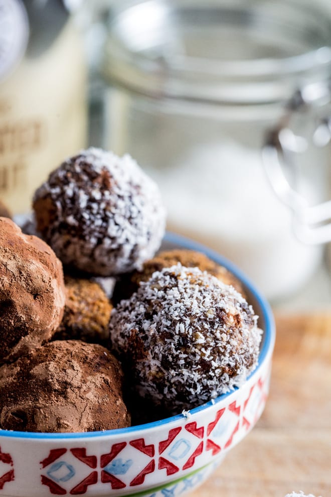 Christmas Spice Chocolate Truffles - these taste like tiny bites of Christmas cake .. with chocolate!! All natural sweetness with warming spices and zesty orange. These are sticky sweet Christmas heaven! #vegantreats #healthychristmas | Recipe on thecookandhim.com