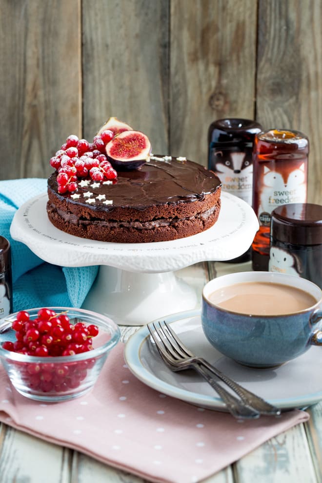 Gluten Free Chocolate Cake - This darkly delicious, layered, gluten free chocolate cake is vegan, naturally sweetened and super simple to make! #veganbaking #glutenfreebaking #vegancake | Recipe on thecookandhim.com