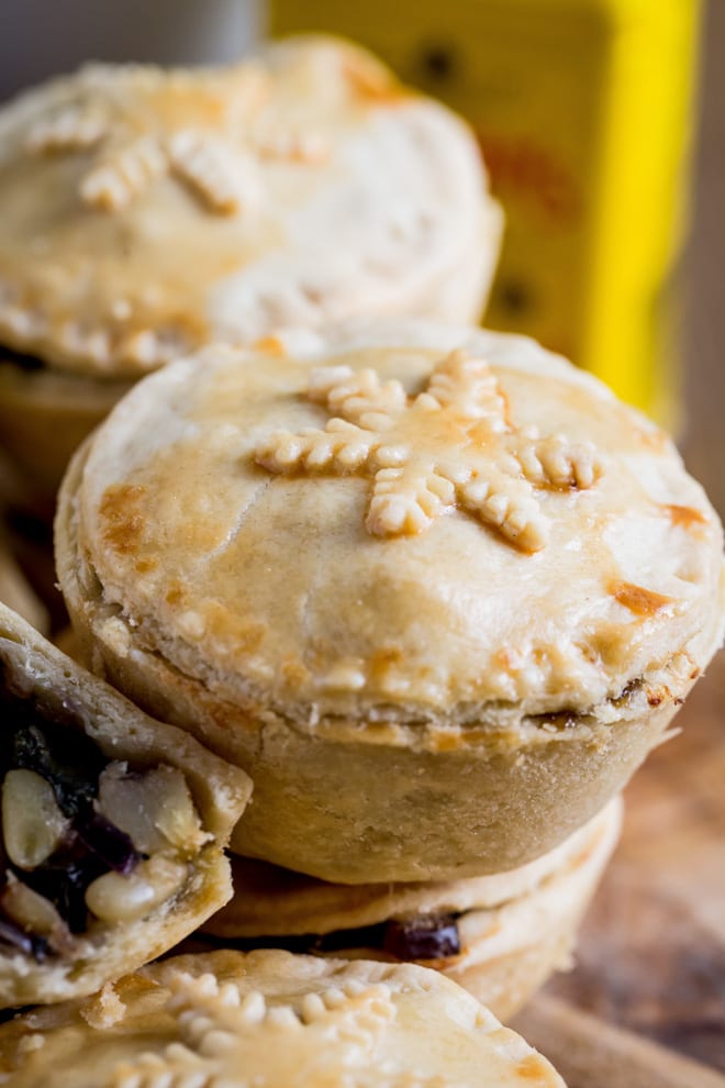 Vegan Christmas Pies - crisp pastry mini pies absolutely packed with seasonal veggies, herbs, chestnuts and vegan cheese #veganchristmas #veganrecipes | Recipe on thecookandhim.com