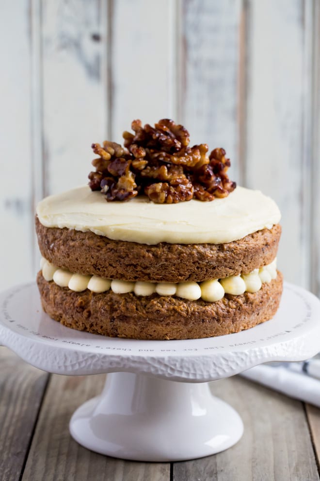 Carrot Cake - a delicate, perfectly spiced vegan sponge cake made with fresh grated carrot and finished with a sweet vegan frosting #vegancake #veganbaking #carrotcake #veganfrosting | Recipe on thecookandhim.com