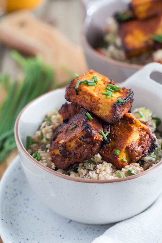 Healthy Indian Takeaway - crisp, succulent tofu marinated in gorgeous warming spices and served with vegetable cauliflower fried rice #veganrecipes #veganmeal #meatfree #healthytakeaway | Recipe on thecookandhim.com