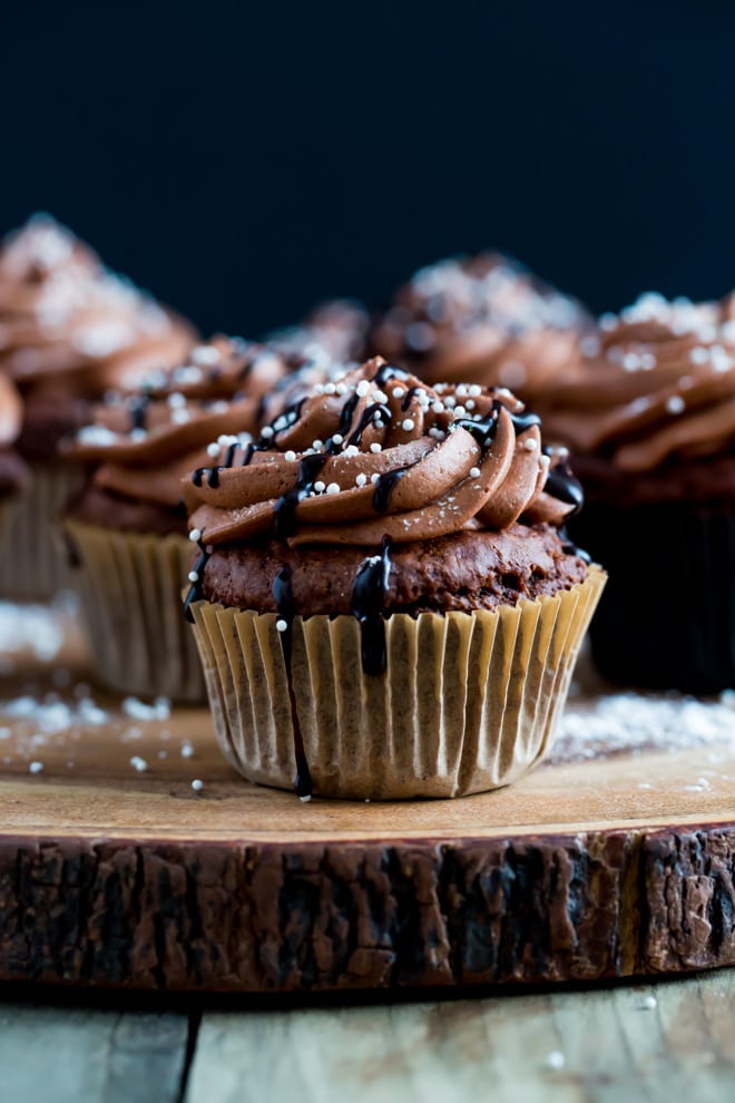 Vegan Chocolate Cupcakes Recipe - light but rich vegan chocolate cupcakes with smooth and creamy vegan chocolate frosting #veganbaking #chocolatecupcakes #veganrecipes | Recipe on thecookandhim.com