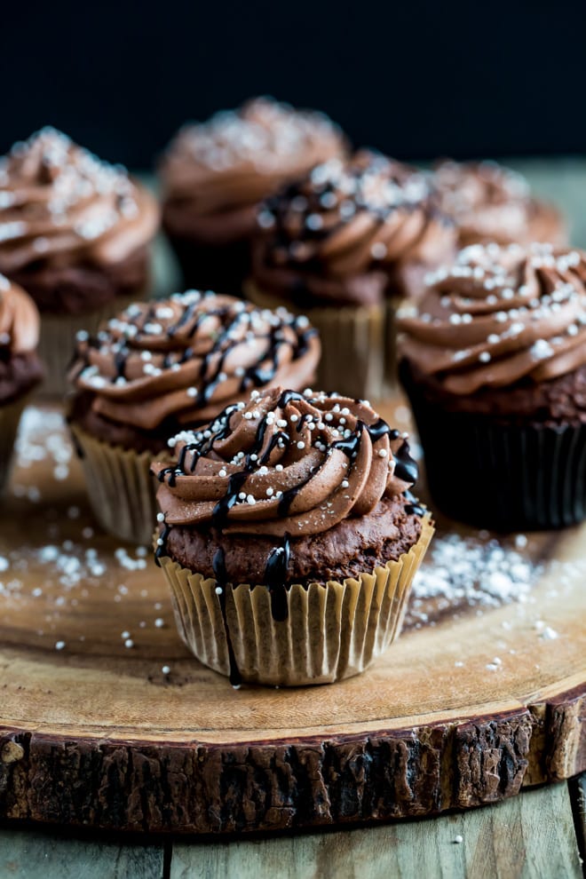 Vegan Chocolate Cupcakes Recipe - light but rich vegan chocolate cupcakes with smooth and creamy vegan chocolate frosting #veganbaking #chocolatecupcakes #veganrecipes | Recipe on thecookandhim.com