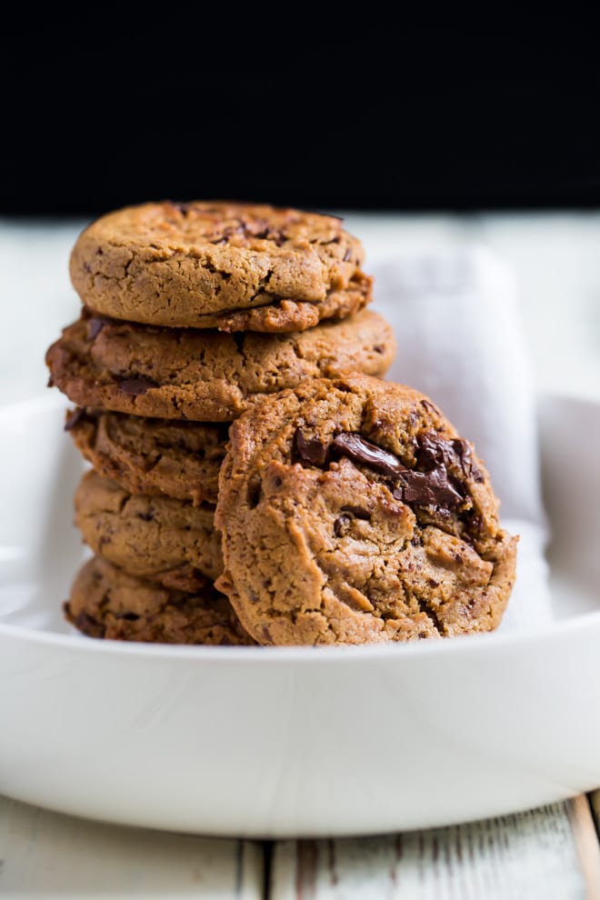 Vegan Cookies - thick, soft cookies loaded with gooey chocolate chunks! No one would ever know they're vegan! #vegancookies #chocolatechipcookies #chocolatechunkcookies | Recipe on thecookandhim.com