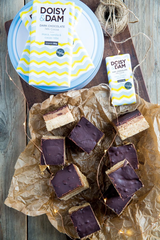 Vegan Millionaire's Shortbread - a rich vegan shortbread base topped with sticky sweet caramel and divine vegan superfood chocolate! #veganbaking #veganchocolate #veganrecipes | Recipe on thecookandhim.com