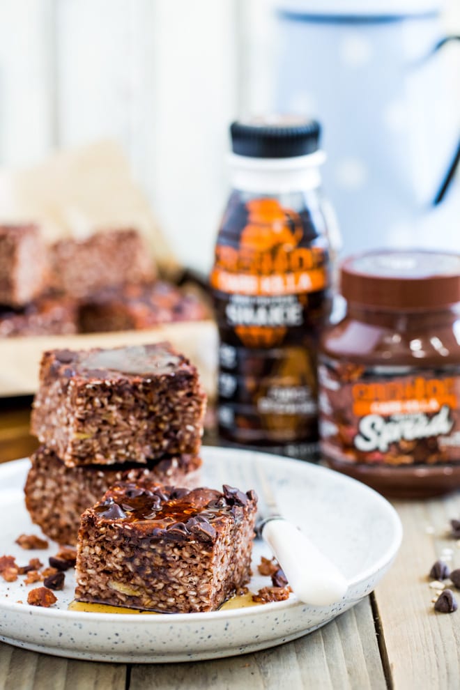 Chocolate Protein Baked Oatmeal - triple chocolate fudgy baked oatmeal with protein shake, protein spread and protein powder! The perfect post work out treat! #bakedoats #proteinbreakfast | Recipe on thecookandhim.com