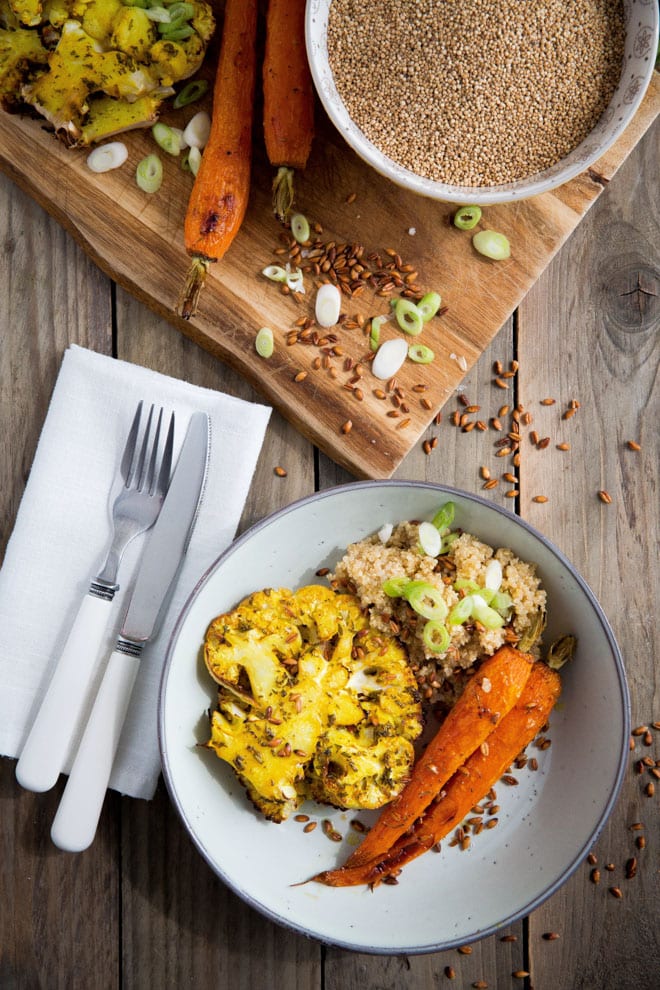 Roast Carrot and Smoked Quinoa Salad with Cauliflower Steaks- herbs, spices, garlic and fresh lemon pack the flavour into the roasted veggies. The smoked quinoa and nutty toasted emmer wheat are wonderful contrasts in flavour and texture! #veganrecipes #veganmeals #quinoa | Recipe on thecookandhim.com