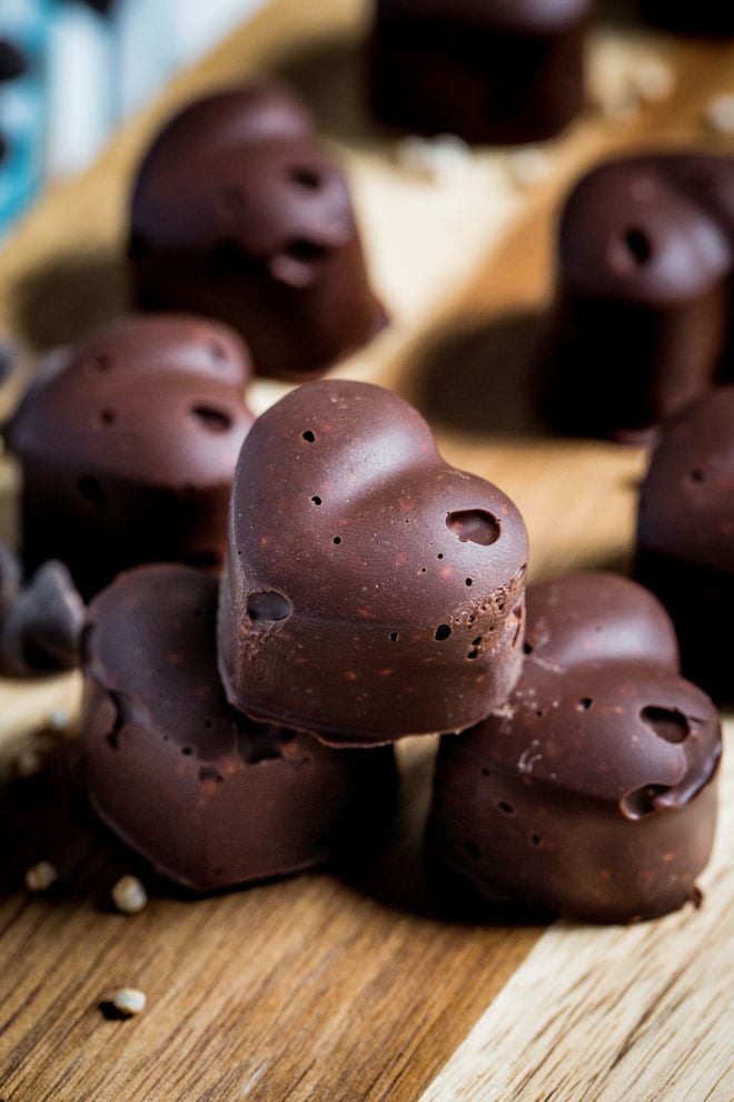 Vegan Chocolate Protein Bites - delicious little morsels of crunchy chocolate heaven given a protein boost from a divine Peace Blend vegan protein powder #veganchocolate #veganprotein #postworkout | Recipe on thecookandhim.com