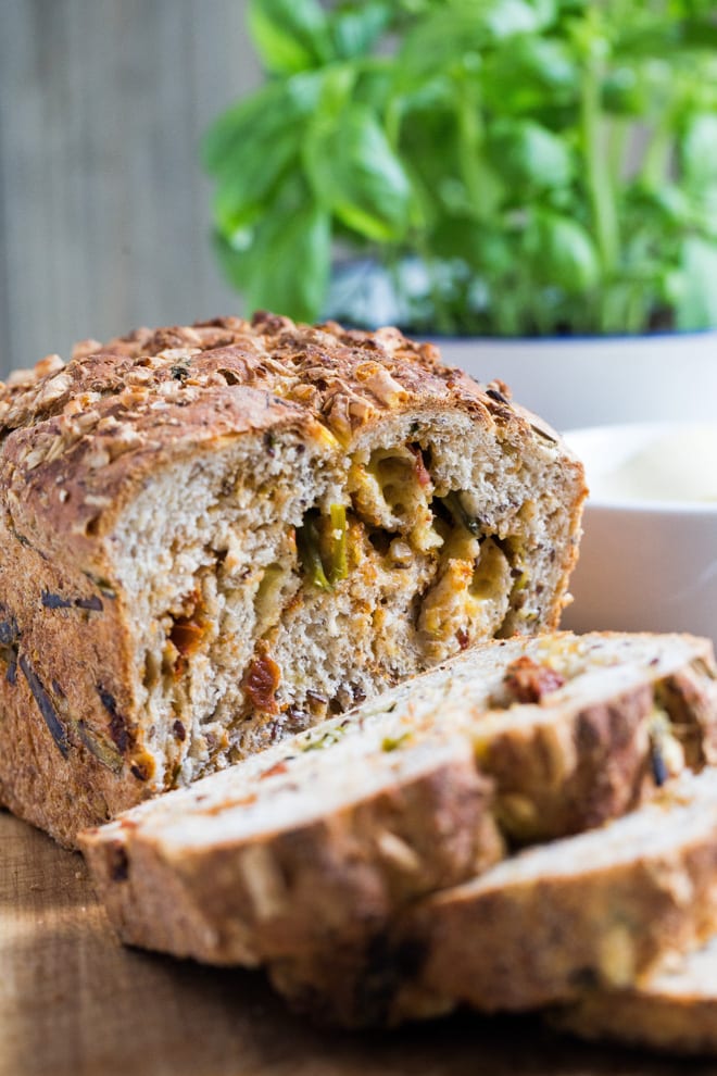 Asparagus and Sun Dried Tomato Bread - all the flavours of spring in every bite, along with tangy tomatoes, melty vegan cheese and aromatic basil! #veganbaking #homemadebread #veganrecipes #asparagus | Recipe on thecookandhim.com