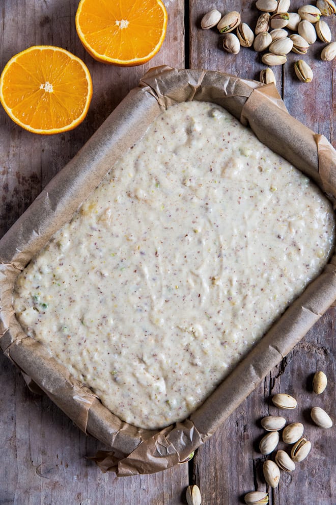 Light, soft and exceptionally moist vegan pistachio cake with an orange caramel syrup #vegancake #veganbaking #veganrecipes #pistachio | Recipe on thecookandhim.com