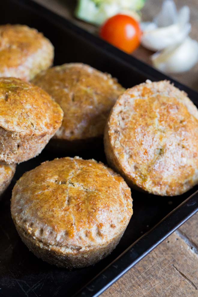 Whole wheat pastry crammed full of veggies and flavour makes these little broccoli pies perfect for lunch boxes, picnics or a quick snack! #minipies #sweetpotato #vegetarianrecipes #veggiepies | Recipe on thecookandhim.com