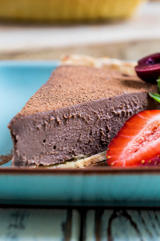 Ultra rich, smooth and creamy this vegan chocolate pie is a complete doddle to make but tastes thoroughly decadent! #veganchocolate #vegandesserts #veganrecipes #silkentofu | Recipe on thecookandhim.com