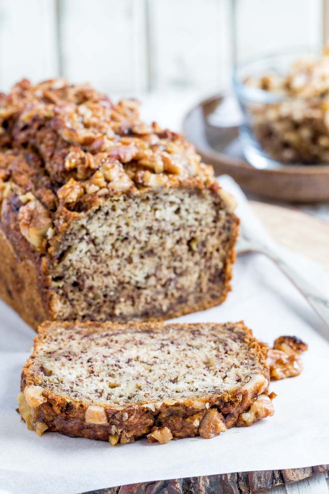 Simple, no frills vegan banana bread - an easy to make one bowl mix full of sweet banana flavour with a moist delicate crumb. Perfect for using up ripe bananas! #veganrecipes #bananabread #veganbananabread | Recipe on the cookandhim.com