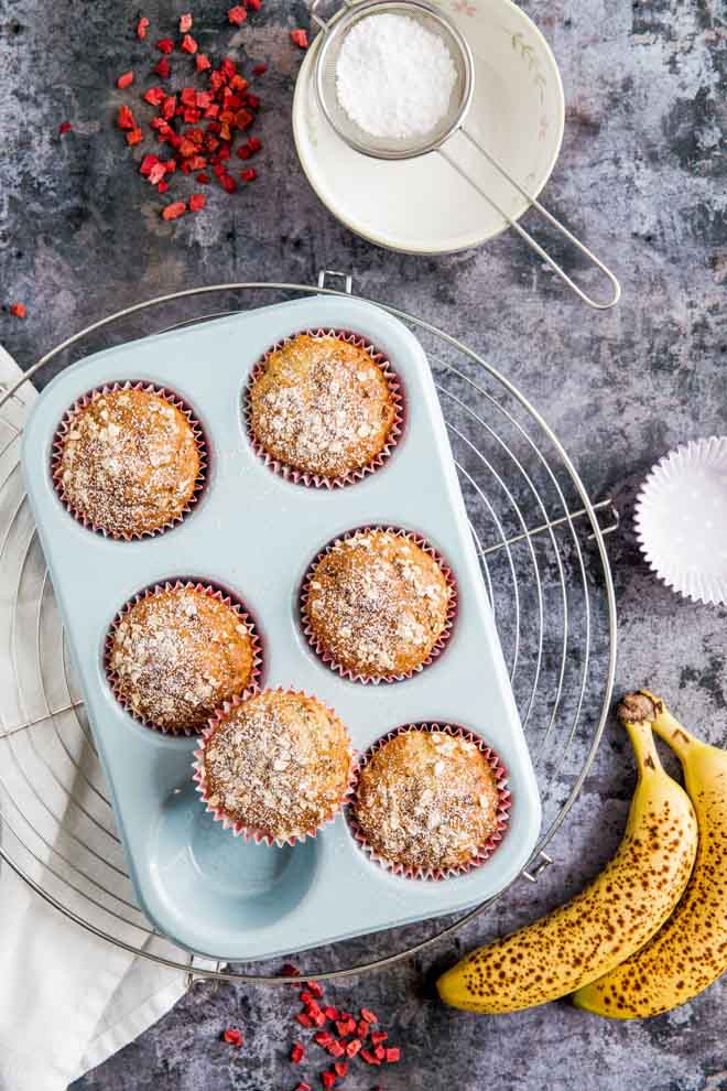 Light, fruity vegan protein muffins with delicious hints of vanilla. The perfect workout snack or grab and go breakfast! #veganprotein #plantbased #veganrecipes #veganmuffins | Recipe on the cookandhim.com