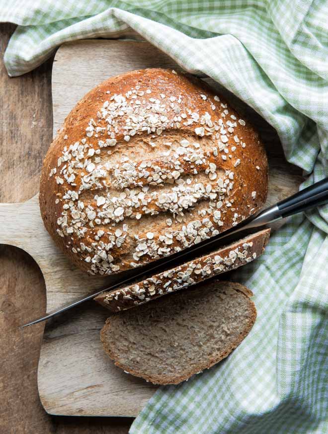 Learn all about how to make your own bread with this easy to follow guide - plus you get an oaty wholemeal loaf to enjoy at the end! #howto #homemadebread #breadbaking | Recipe on thecookandhim.com