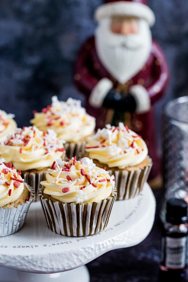 These Christmas Pudding Muffins are the perfect festive treat topped with rich and creamy Irish cream frosting - guaranteed to get you in the Christmas spirit! #veganbaking #veganmuffins #veganchristmas #veganrecipes #veganfrosting | Recipe on thecookandhim.com