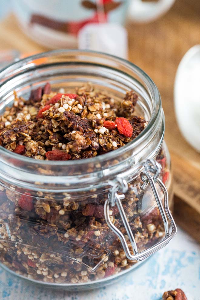 Vegan and gluten free this gingerbread granola makes the perfect healthy topping to your festive breakfast! Sprinkle on porridge, overnight oats, yoghurt and more! #gingerbread #veganbreakfast #granola #homemadegranola #healthygranola #sugarfree