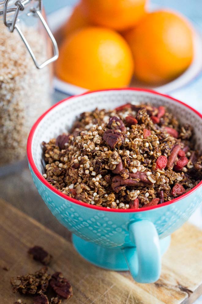 Vegan and gluten free this gingerbread granola makes the perfect healthy topping to your festive breakfast! Sprinkle on porridge, overnight oats, yoghurt and more! #gingerbread #veganbreakfast #granola #homemadegranola #healthygranola #sugarfree
