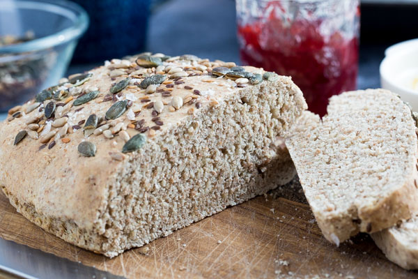 This wonderfully adaptable no-knead bread is made with just a few store cupboard ingredients and 5 minutes of mixing for crusty homemade bread! #nokneadbread #veganrecipes #veganbread #easybread #homemadebread #bread | Recipe on thecookandhim.com