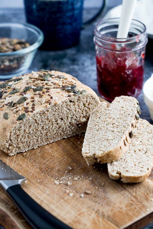 This wonderfully adaptable no-knead bread is made with just a few store cupboard ingredients and 5 minutes of mixing for crusty homemade bread! #nokneadbread #veganrecipes #veganbread #easybread #homemadebread #bread | Recipe on thecookandhim.com