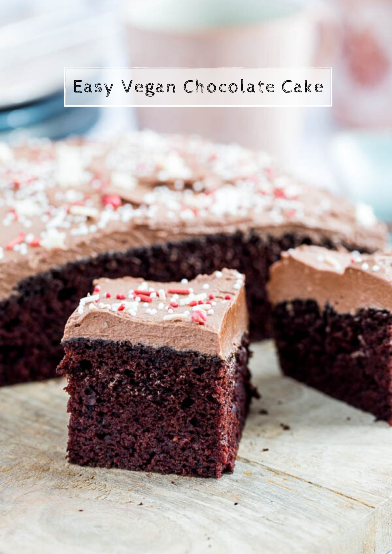 This super chocolatey easy vegan chocolate cake is rich, fudgy and made with basic store cupboard ingredients. You'd never guess it's vegan! #vegancake #easyvegancake #veganchocolatecake #egglesschocolatecake #veganspongecake | Recipe on thecookandhim.com